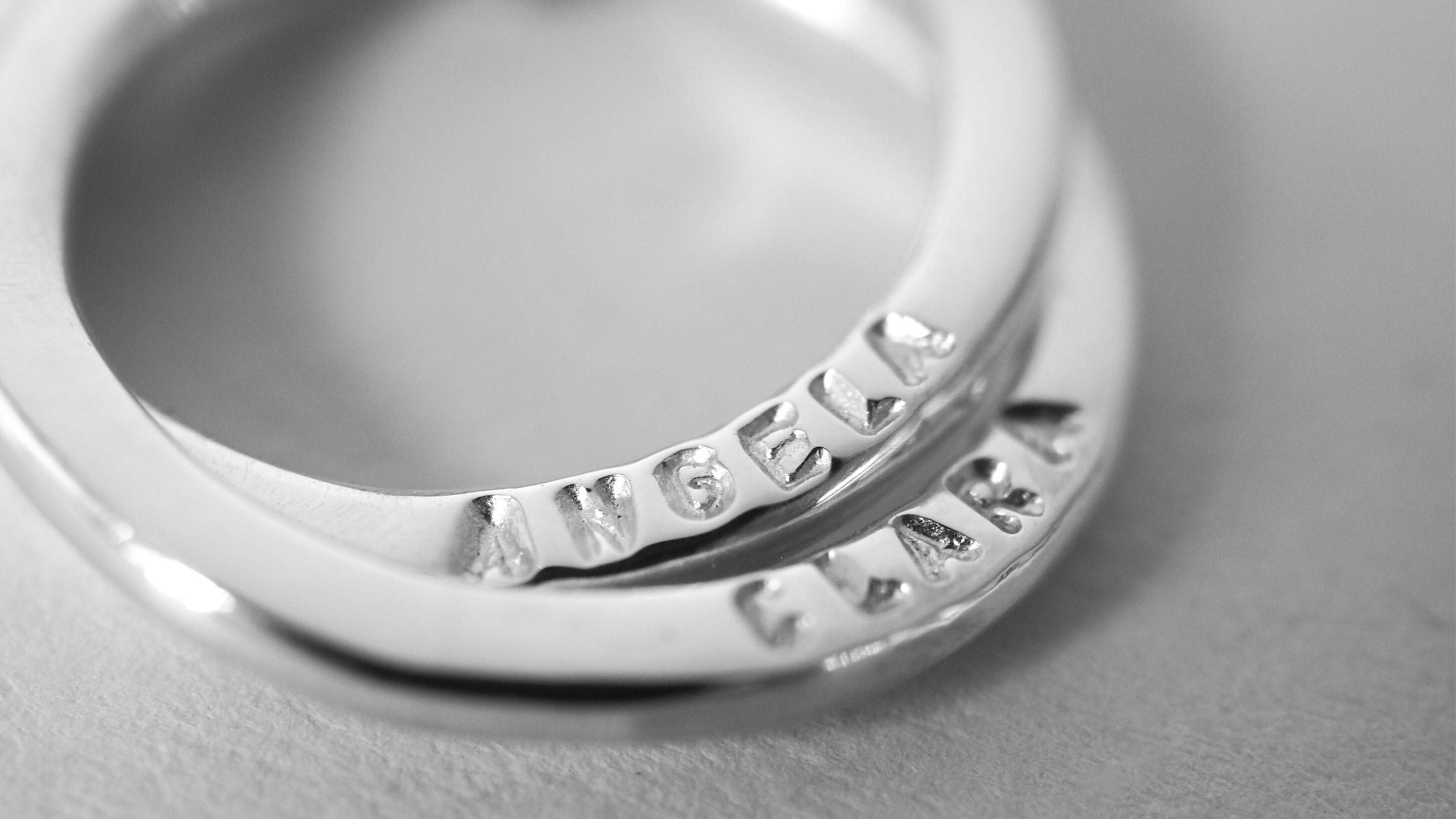 Hand- Stamped names on a personalised necklace