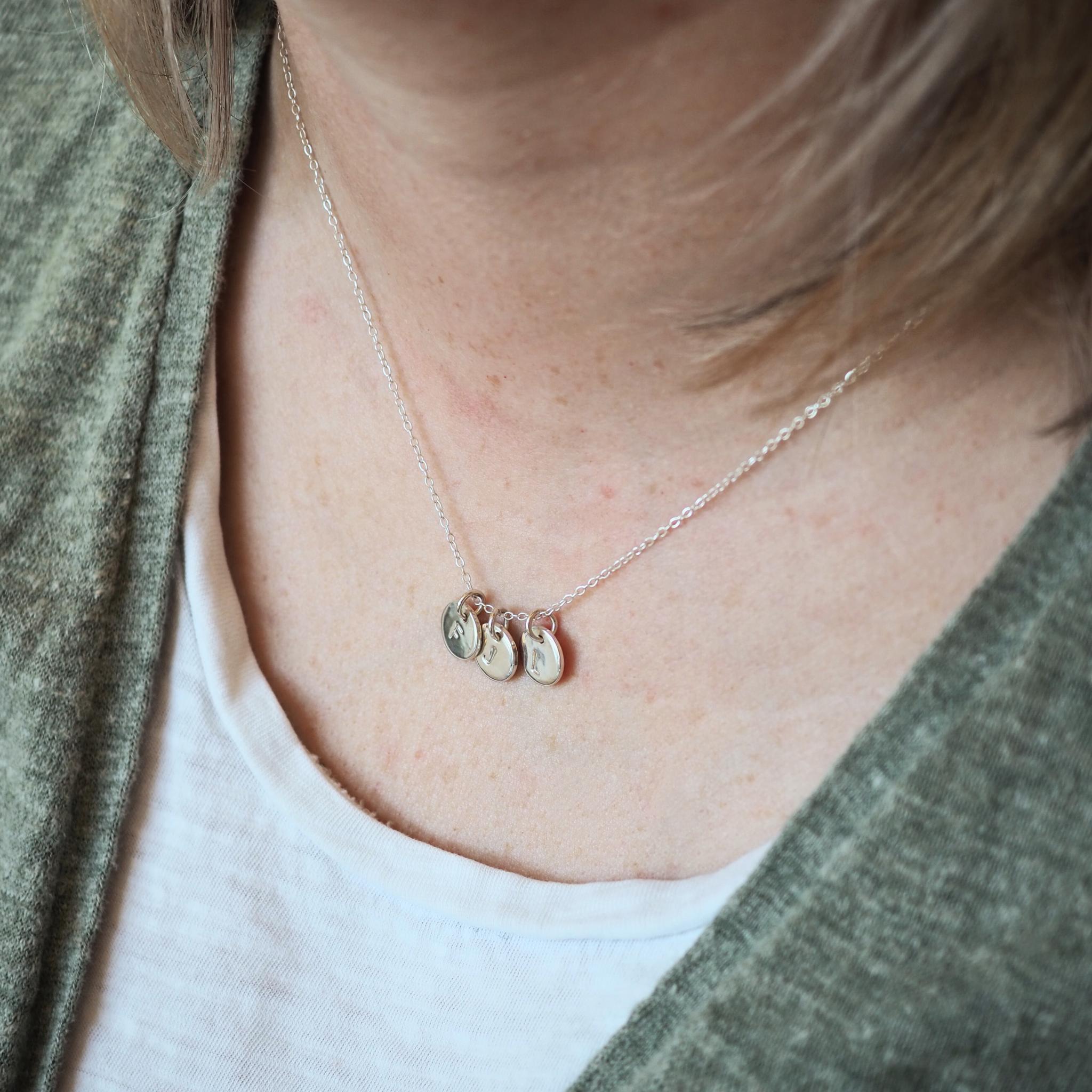 Three-disc initial necklace in sterling silver