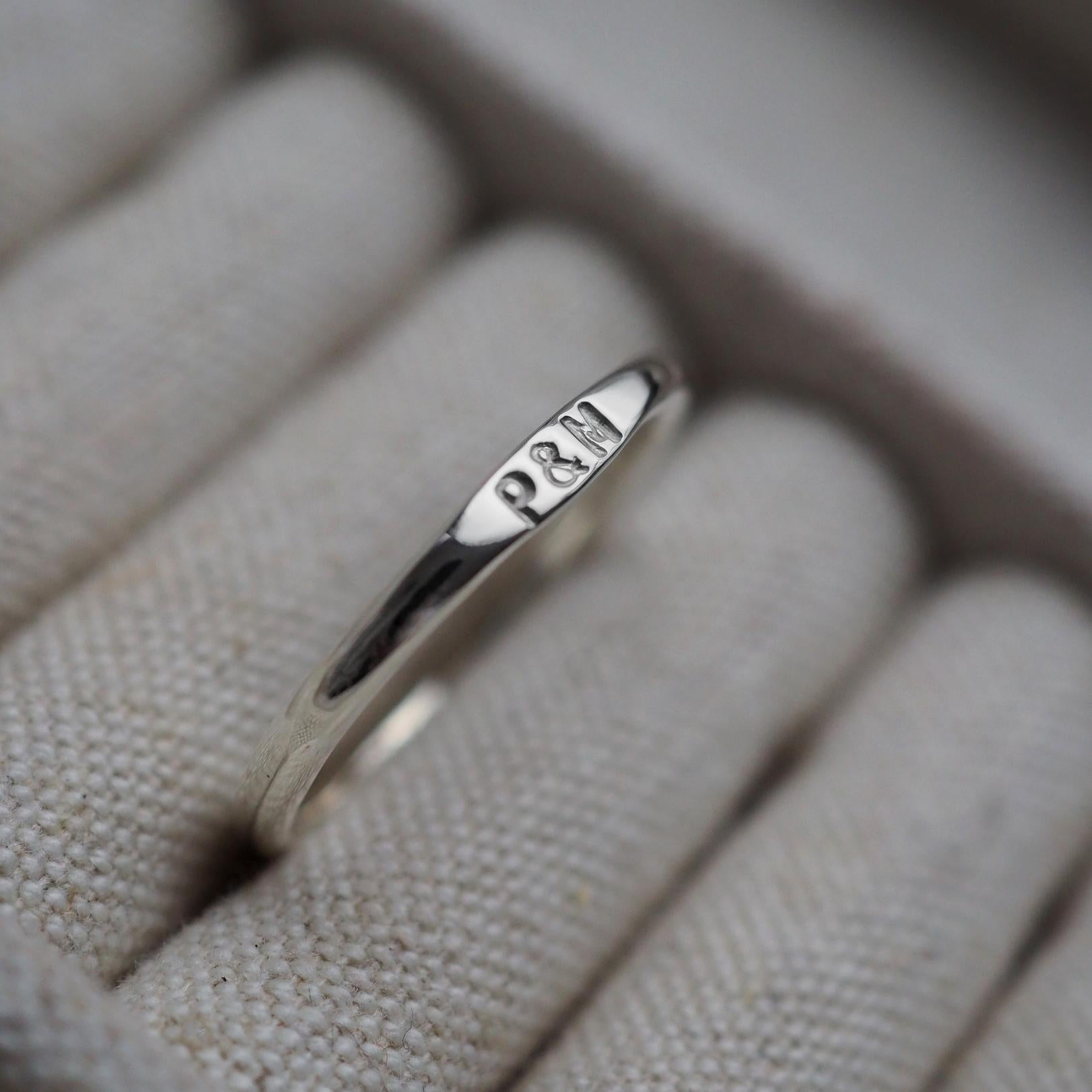 Silver ring store with engraved initials