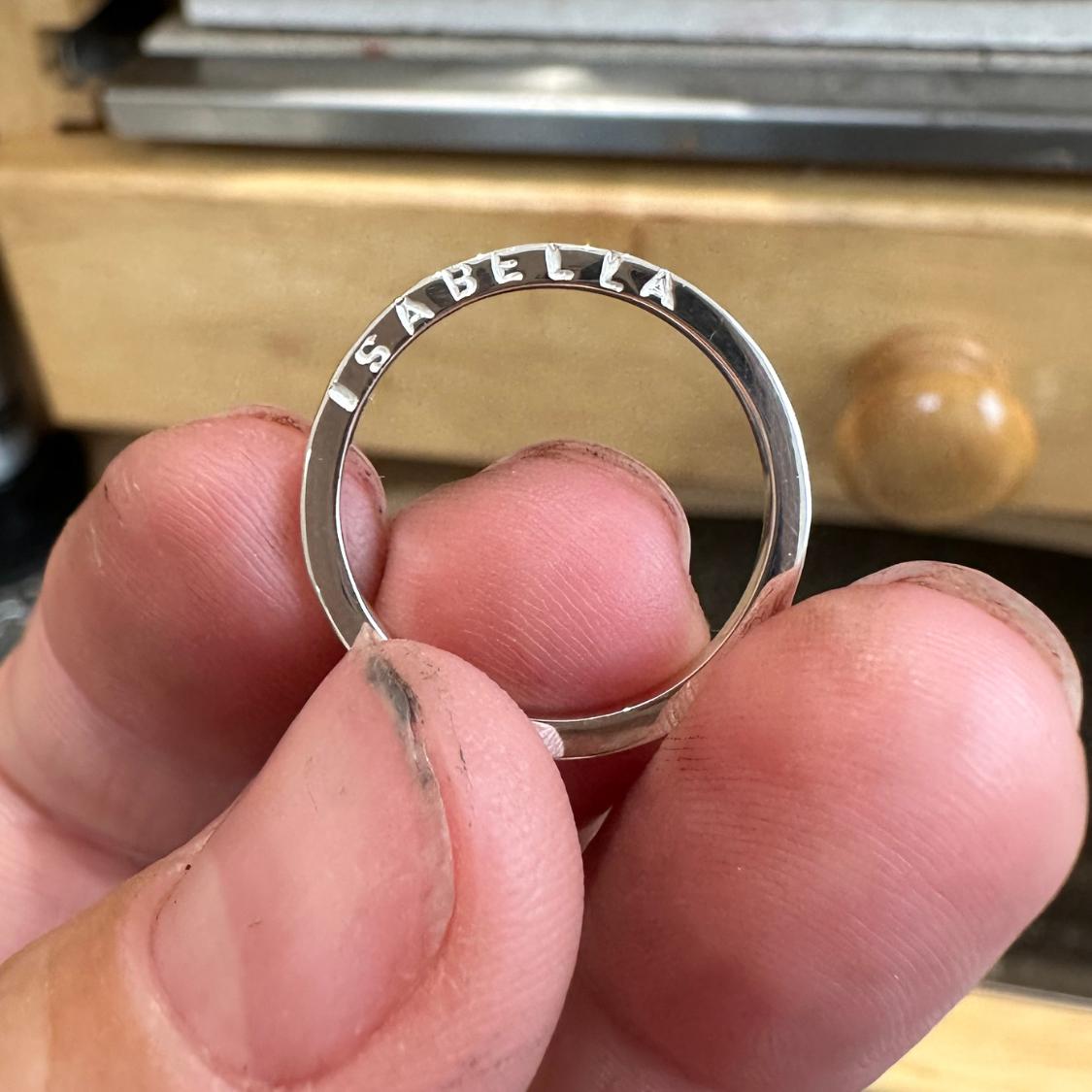 Sterling silver rings personalised with a handstamped name