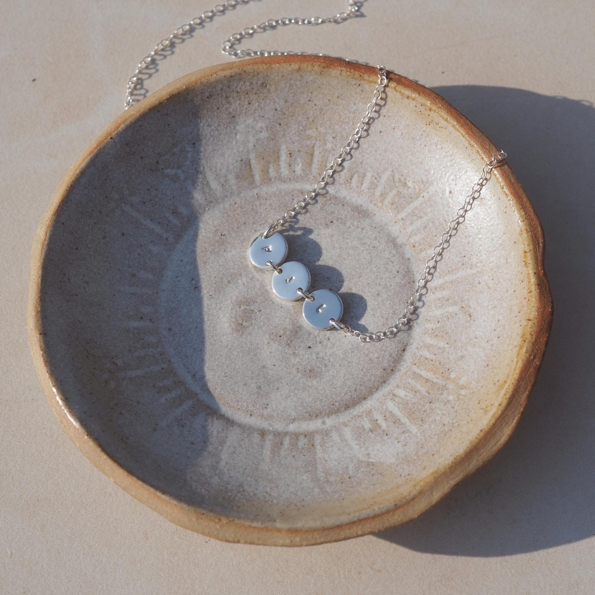 Joined initial disc necklace in sterling silver