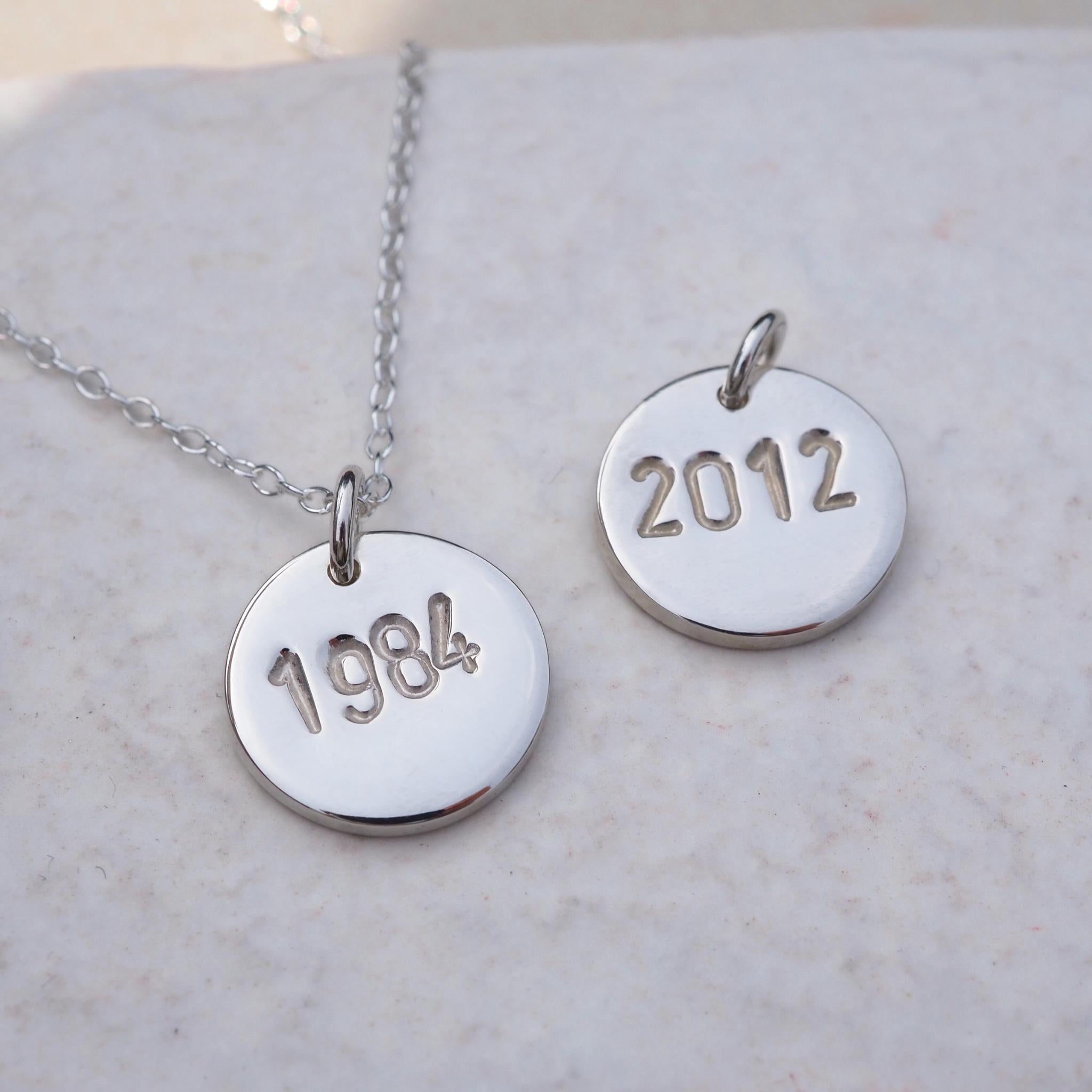 Sterling silver year necklace, personalised with hand-stamped milestone date