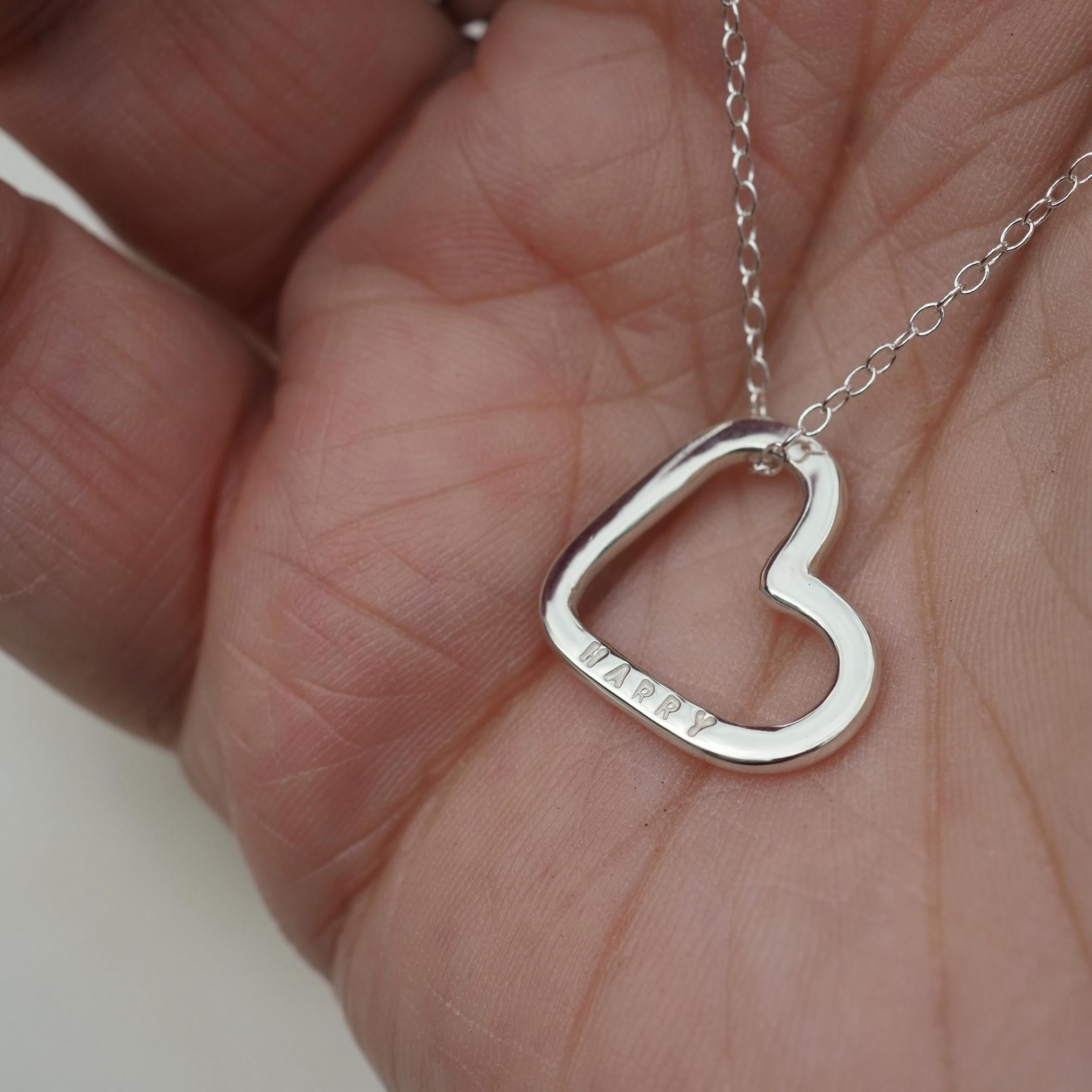 Open heart necklace in sterling silver with a hand-stamped name