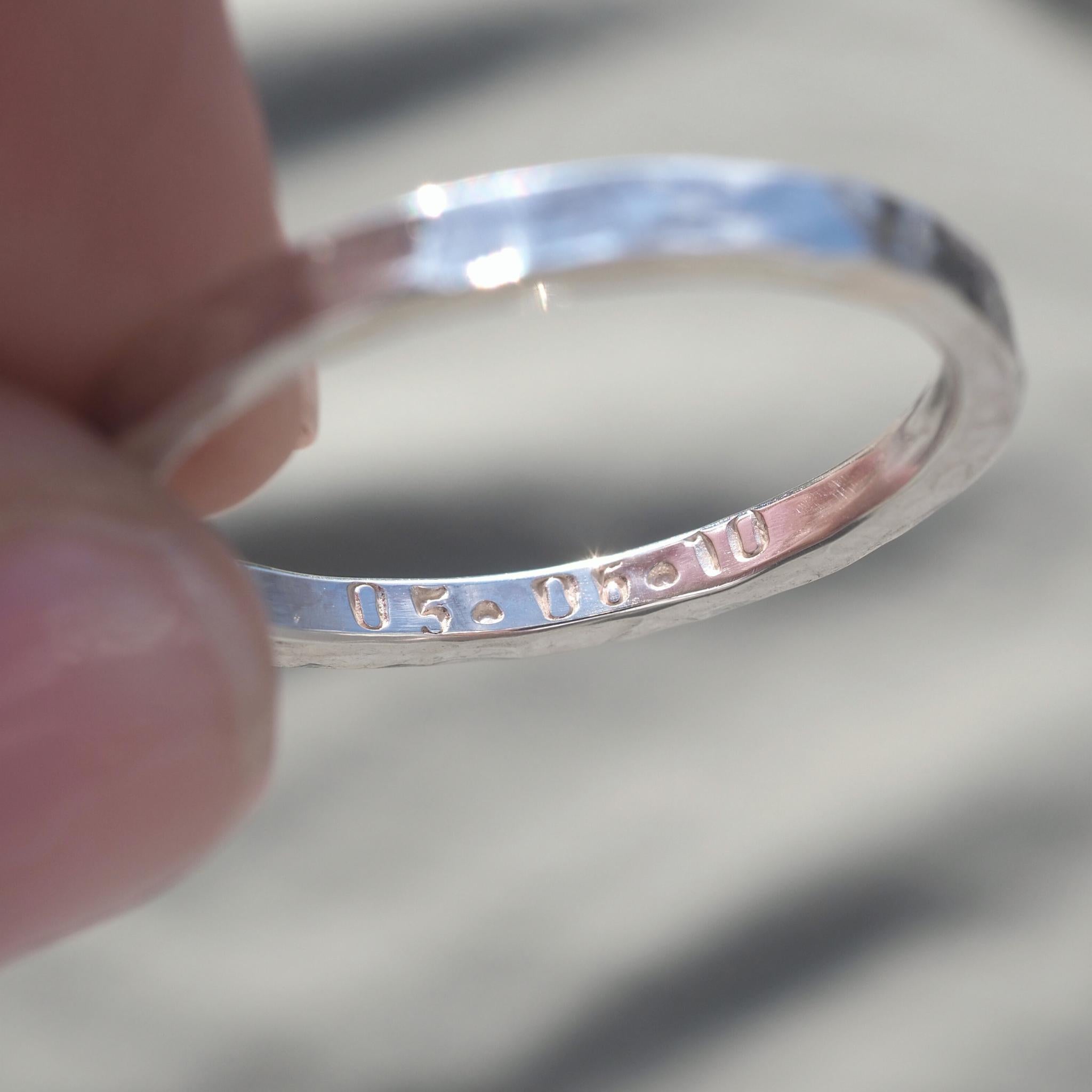 Sterling silver ring personalised with a date.