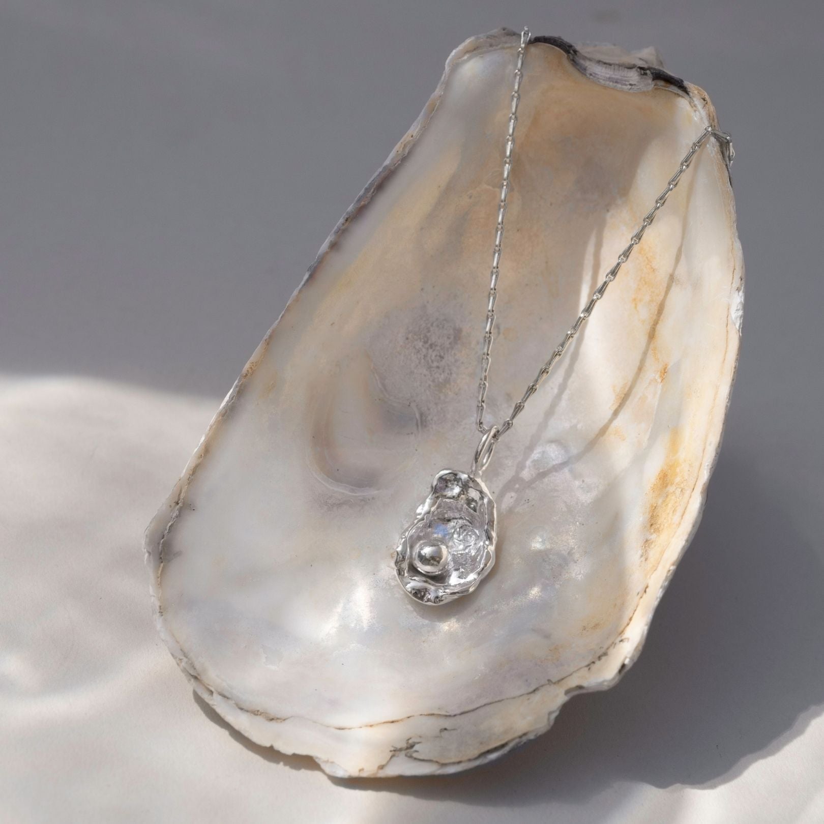 Sterling Silver Watercast Oyster Necklace